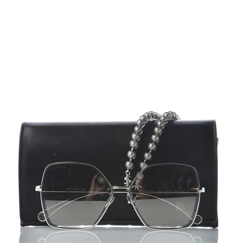 Chanel butterfly sunglasses with chain